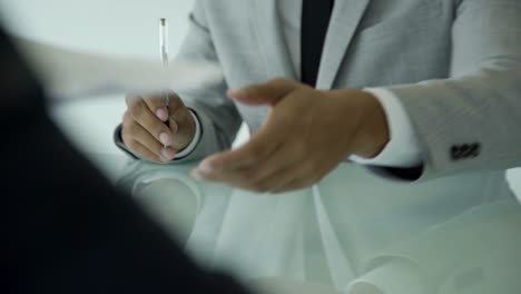 cropped shot of young man signing documents.