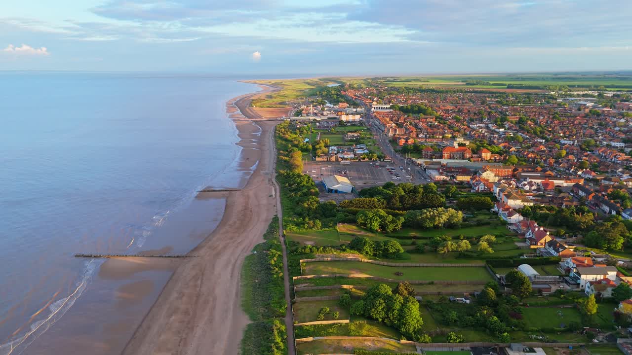 Aerial view of a coastal town and beach