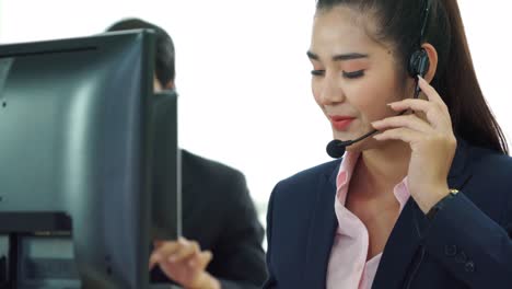 business people wearing headset working in office