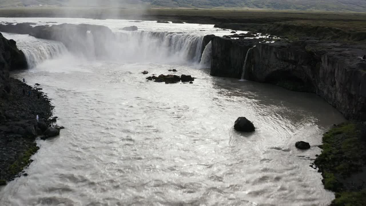 Glacier Skjálfandafljót river flying towards Goðafoss waterfall in Iceland