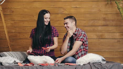 happy couple posing in studio. studio lifestyle portrait of happy couple in love