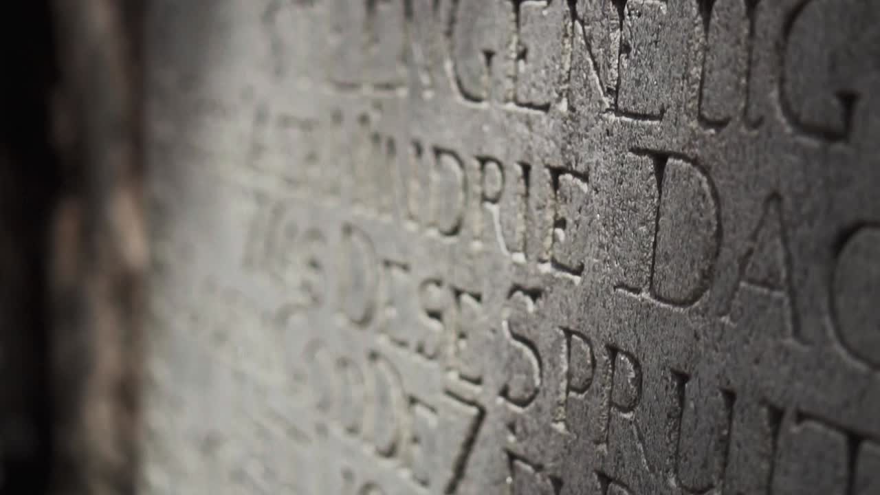 Close-Up Shot Of An Ancient Letter Engrave Monument Stone