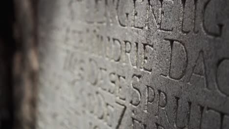 close-up shot of an ancient letter engrave monument stone
