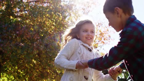 Children-holding-hands-and-turning