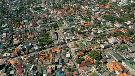 4k cinematic urban drone footage of a panoramic aerial view of the city of chiang mai, thailand on a sunny day