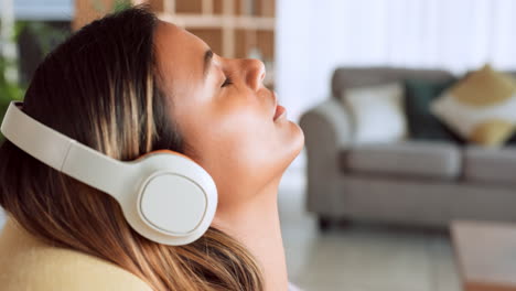 woman, headphones and relax listening to music