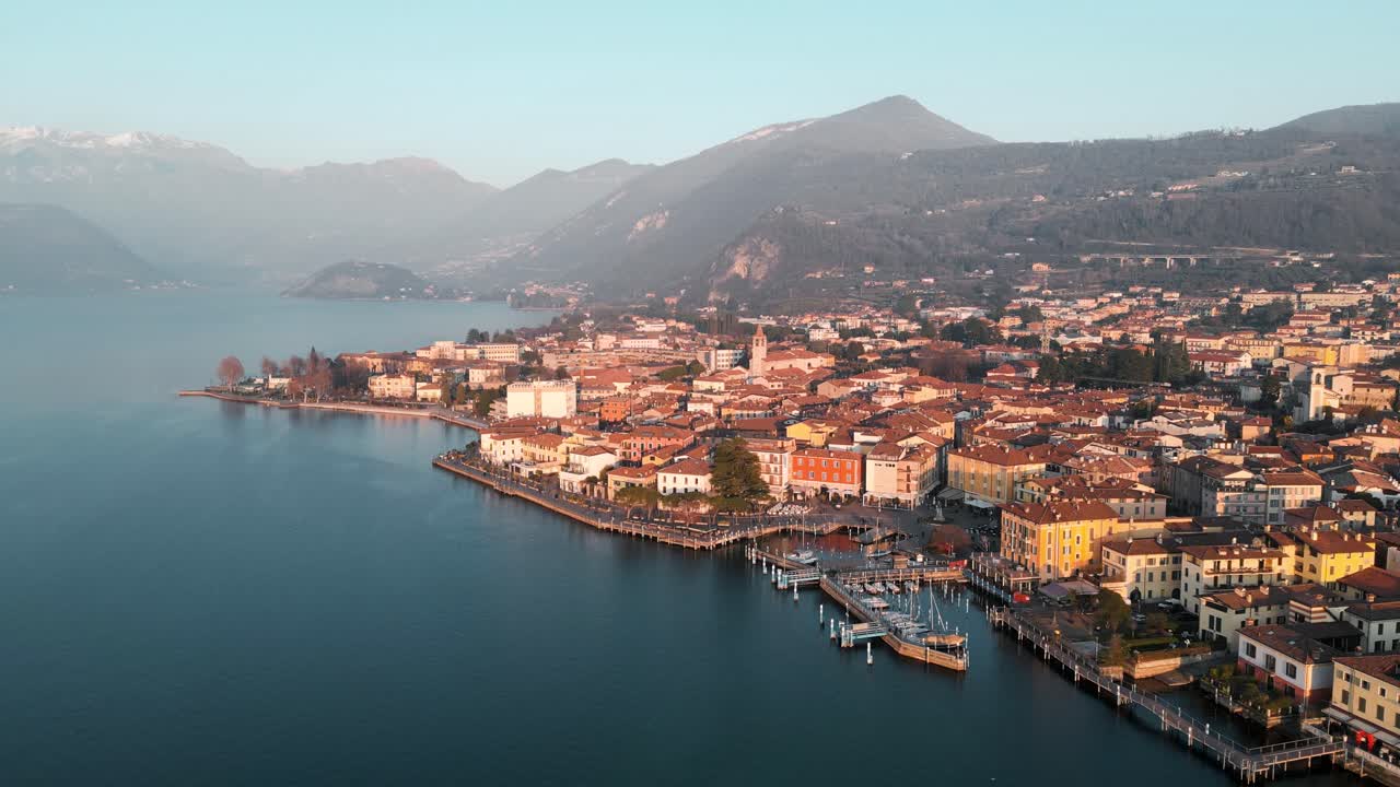 Aerial view city Iseo in Italy during sunset. Small town on Lake Iseo, tourist destination in Italian north in the mountains Alps between Lake Garda and Lake Como.