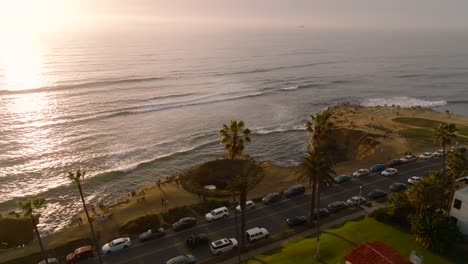 Aerial-View-of-Sunset-Cliffs-Cave-During-Sunrise-In-Point-Loma,-San-Diego,-California