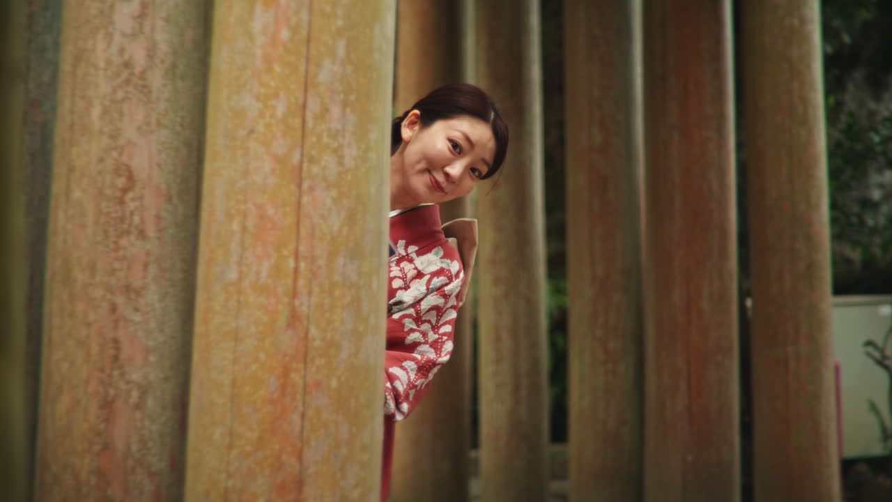 Woman in Kimono at Torii Gate
