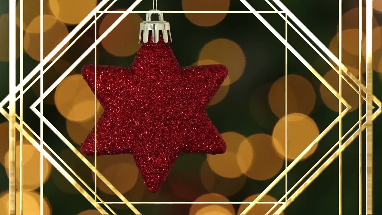 animación de formas doradas sobre decoraciones navideñas y manchas de luz sobre fondo negro.