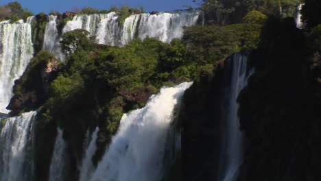 iguacu falls flowing at the argentina/brazil border
