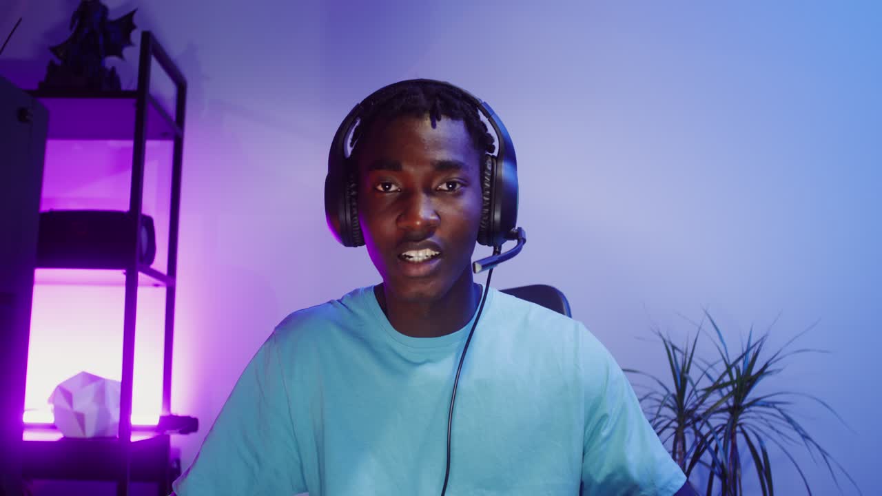 Man with Headset in Gaming Setup