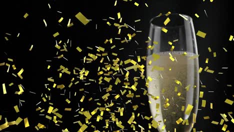 Animation-of-champagne-in-glass-with-gold-confetti-falling-on-black-background