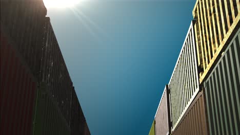 shipping containers under a blue sky