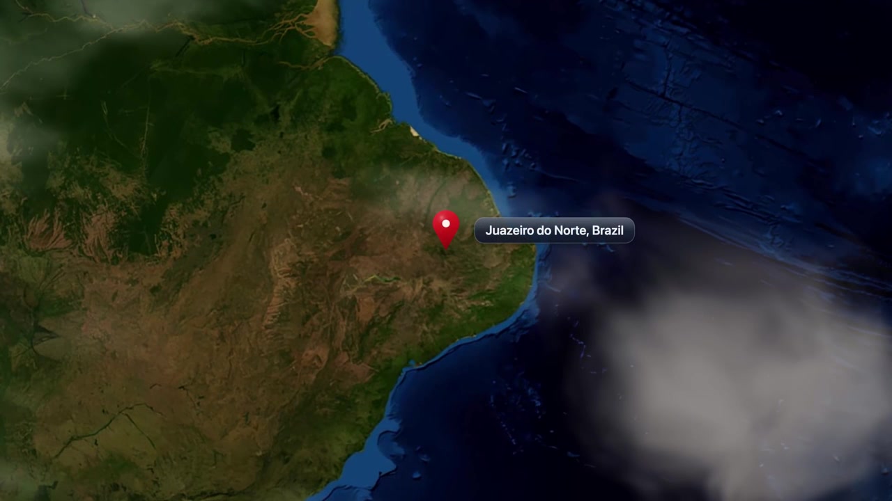 Realistic satellite camera zooms in from space to pinpoint Juazeiro do Norte, Brazil. Includes NASA public domain imagery.
