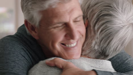 happy mature man hugging wife middle aged couple enjoying romantic relationship embracing sharing good news feeling joy 4k footage