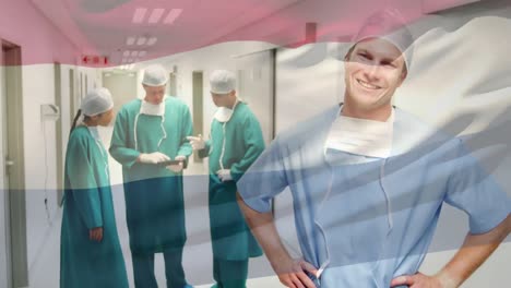 Animation-of-flag-of-netherlands-waving-over-surgeons-in-operating-theatre