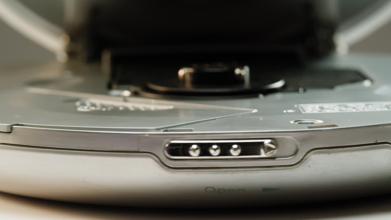 Vintage cd music player close-up. Using portable music player for listening with compact disc