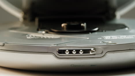 vintage cd music player close-up. using portable music player for listening with compact disc