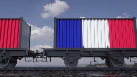 containers with the flag of france. railway transportation