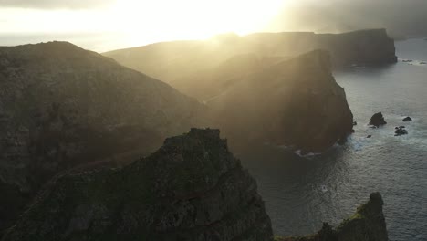 hazy and beautiful sunset over the cliffs of madeira