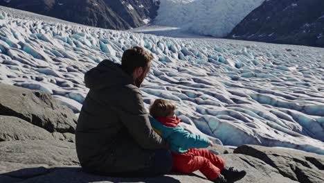 father and son enjoying glacier views