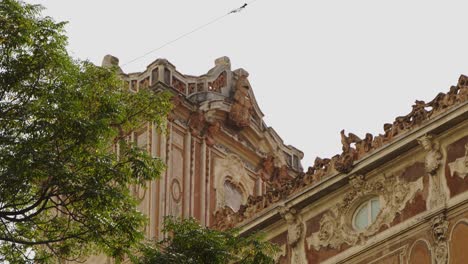 historical spanish archetecture, art and cathedral roof and trees- valencia, spain 4k 24fps