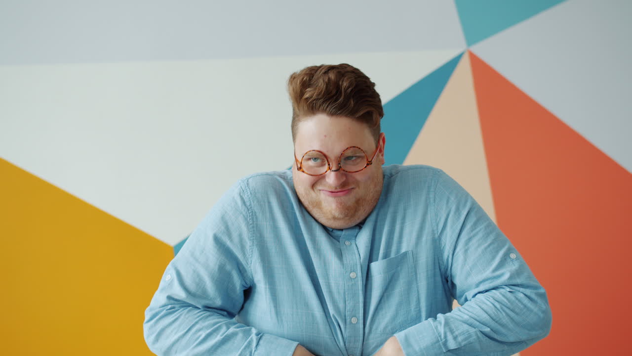 Funny Man with Glasses Making Silly Expressions
