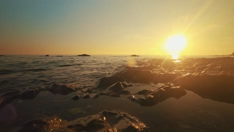 time lapse of sunset at a rocky beach