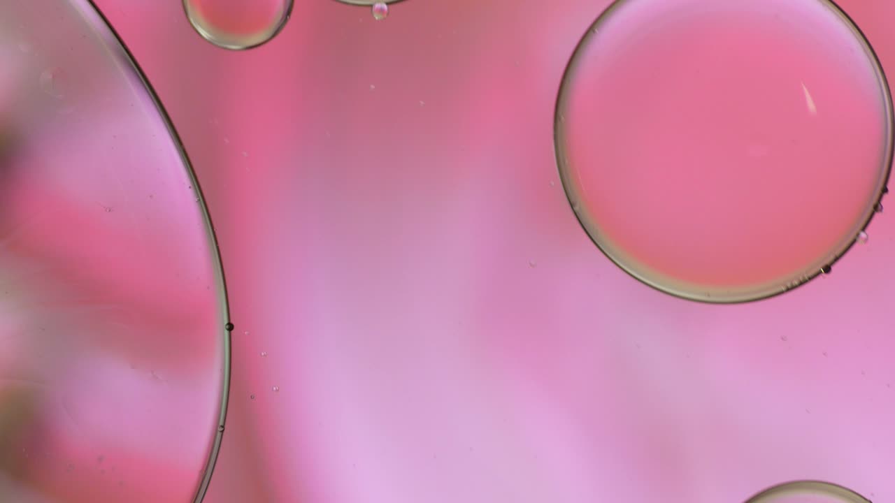 Colorful artistic of oil drop floating on the water.