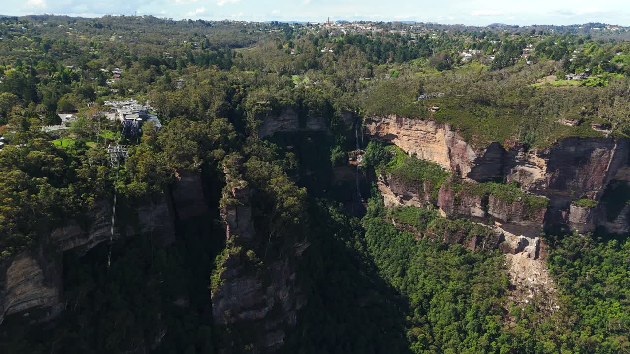 Aerial: Katoomba Falls, segmented waterfall during the day in the Blue Mountains National Park, New South Wales, Australia, orbit drone shot