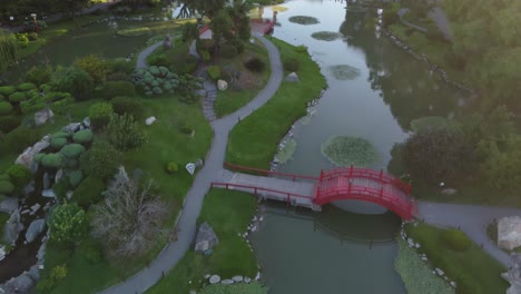 Pond-or-lake-in-Japanese-garden-at-sunset,-Buenos-Aires-city-in-Argentina