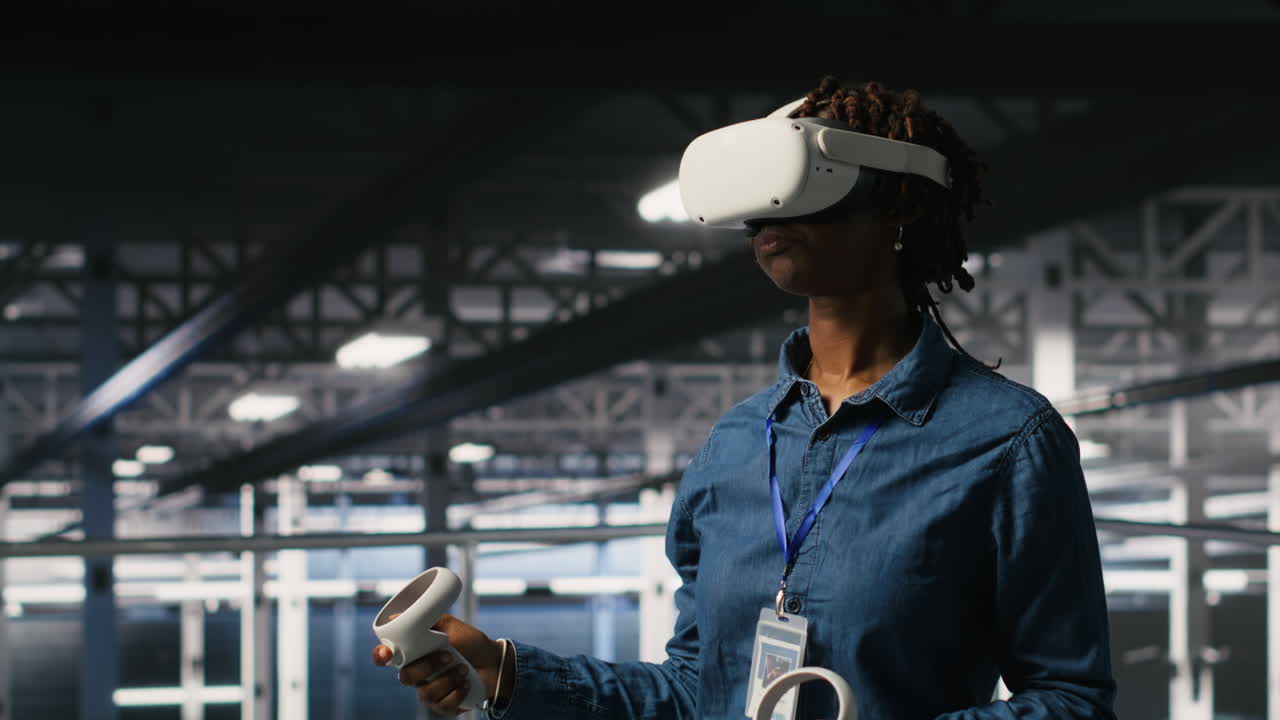 Engineer in data center analyzing performance outputs using virtual reality