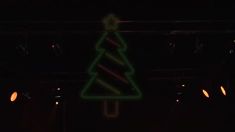 animation of christmas neon over street lights