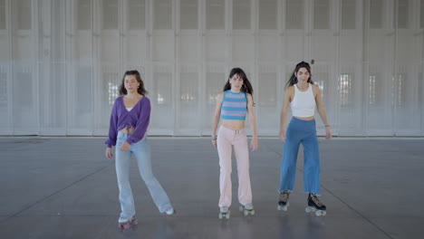 three women roller skating