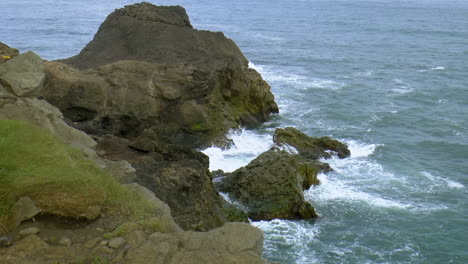 slow motion footage of waves crashing on icelandic coast