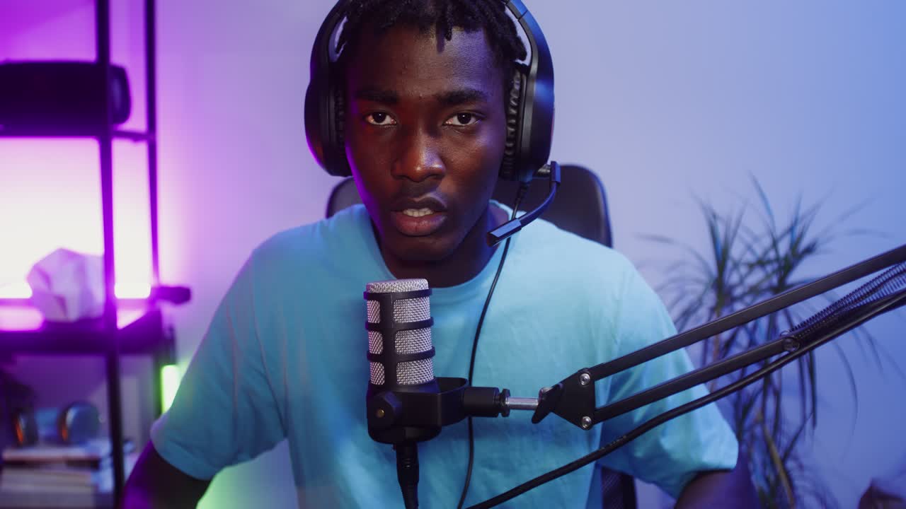 Man streaming with microphone and headset