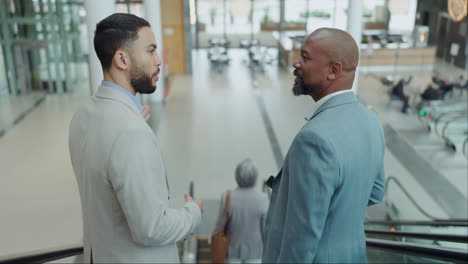 Escalator,-discussion-and-business-men-in-office