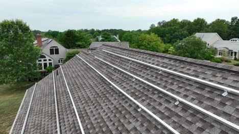 metal tracks on roof preparing for solar panel installation