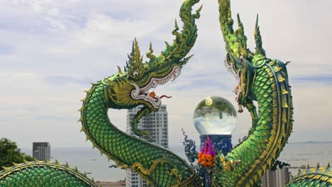 captivating viewpoint with green guardian and crystal ball in thailand