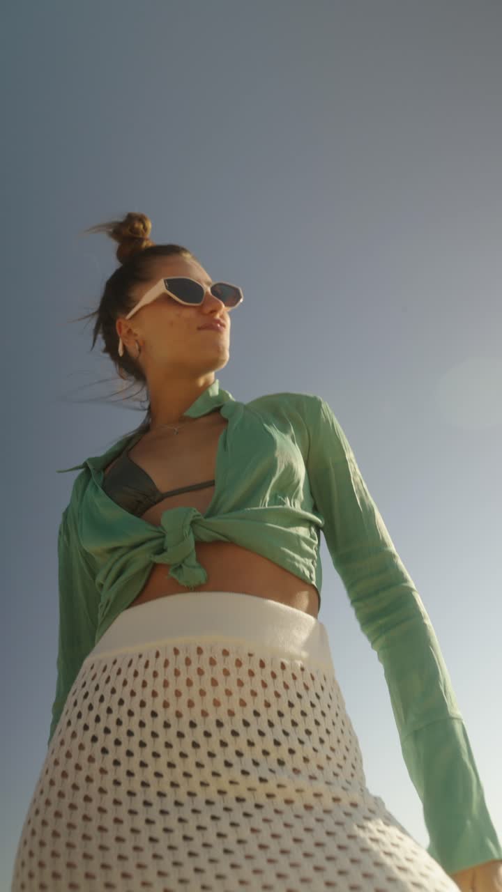 A woman at the beach in summer