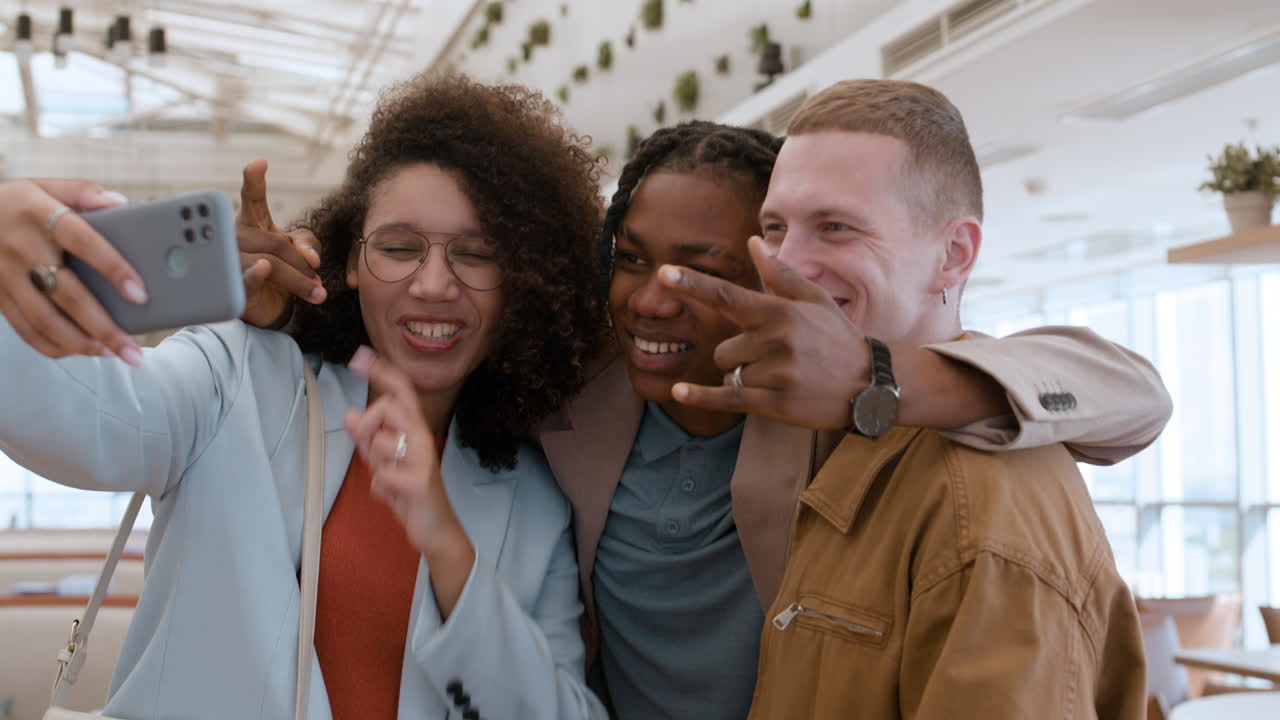 Friends Taking a Selfie in a Restaurant