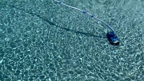 automatic pool cleaner in action