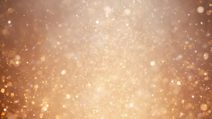 Drifting golden bokeh discs and glitter specks filling studio backdrop on play, soft halo for decor