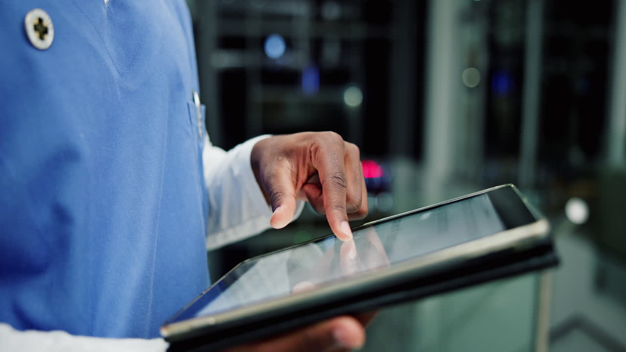 Doctor using tablet in modern hospital