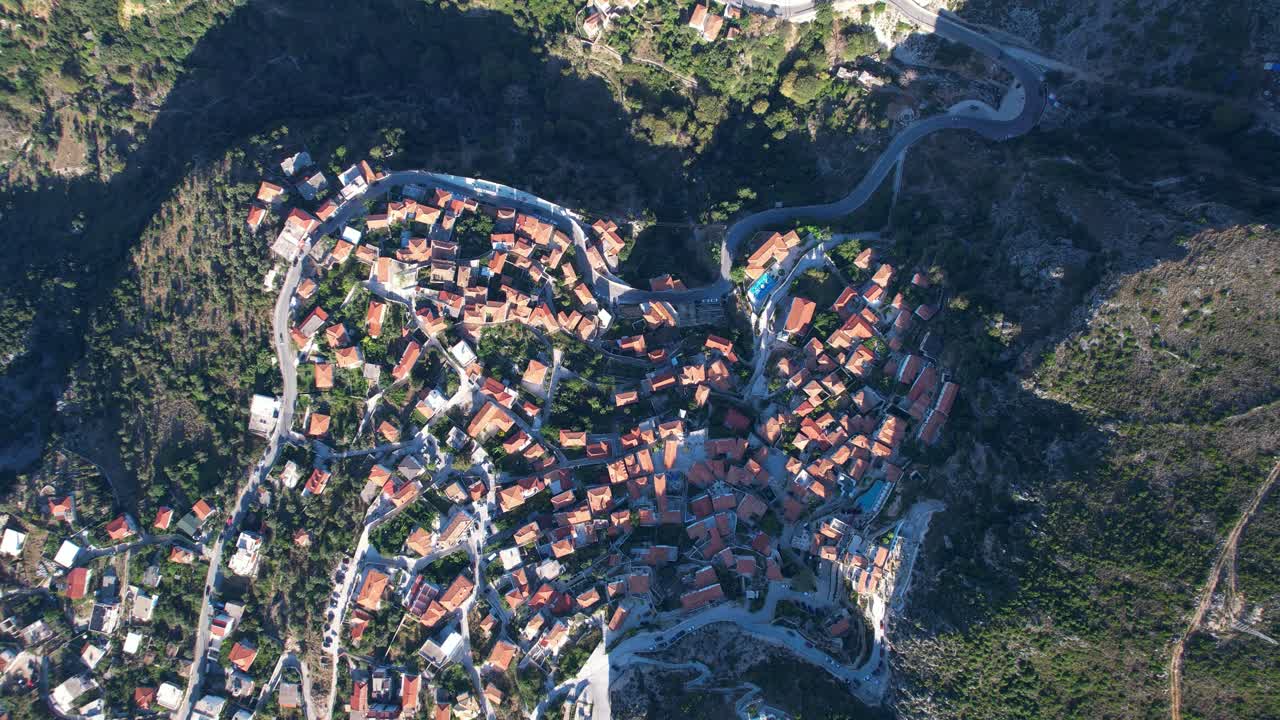 Bird's Eye View of Dhermi Village with Red Roofs in Riviera of Albania, Mediterranean Charm Scenic Aerial Perspective