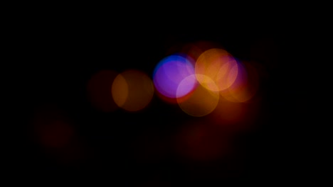 bokeh effect of vehicles in traffic lights