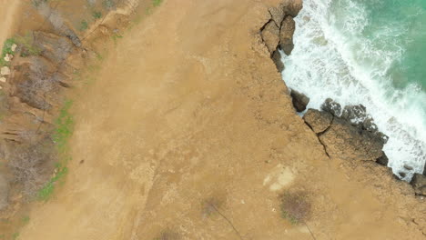 Sea-Waves-Crashing-On-Rugged-Mediterranean-Coast-In-Cyprus