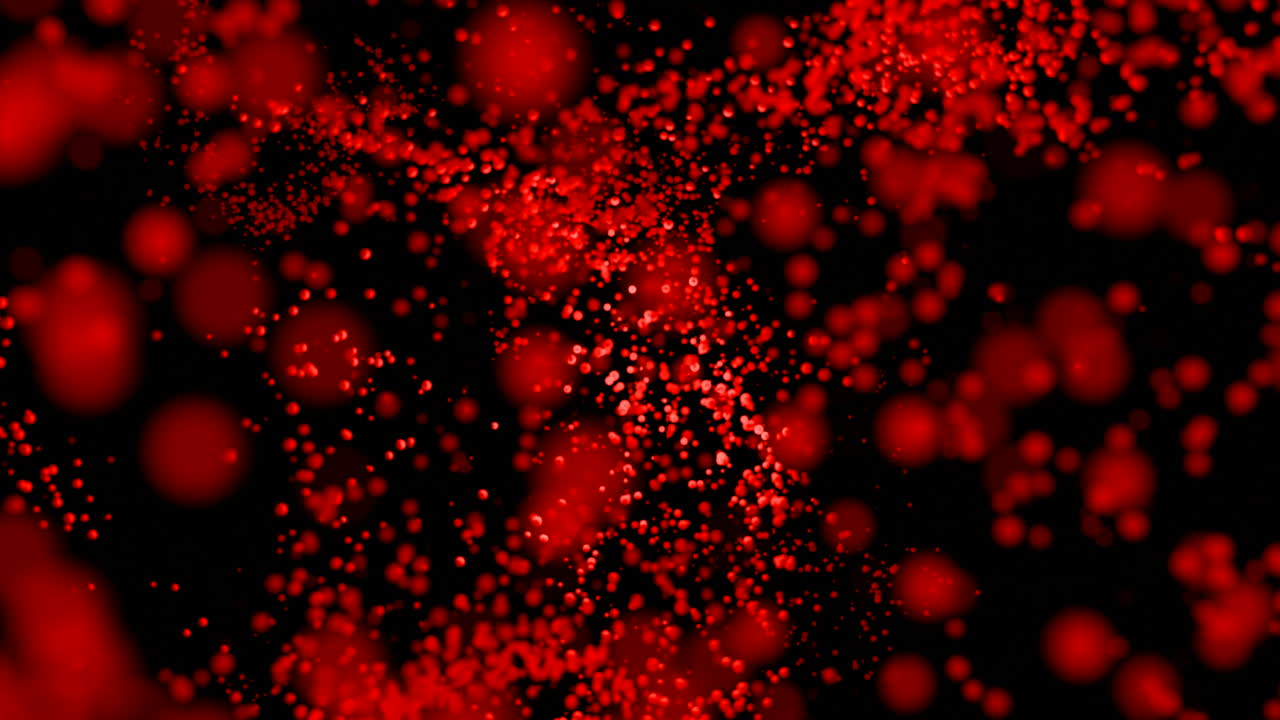 검은 배경에 빨간 입자