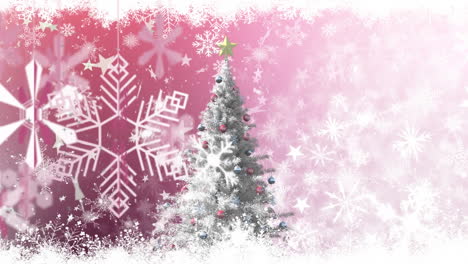 animación del árbol de navidad sobre la nieve que cae sobre un fondo rosa